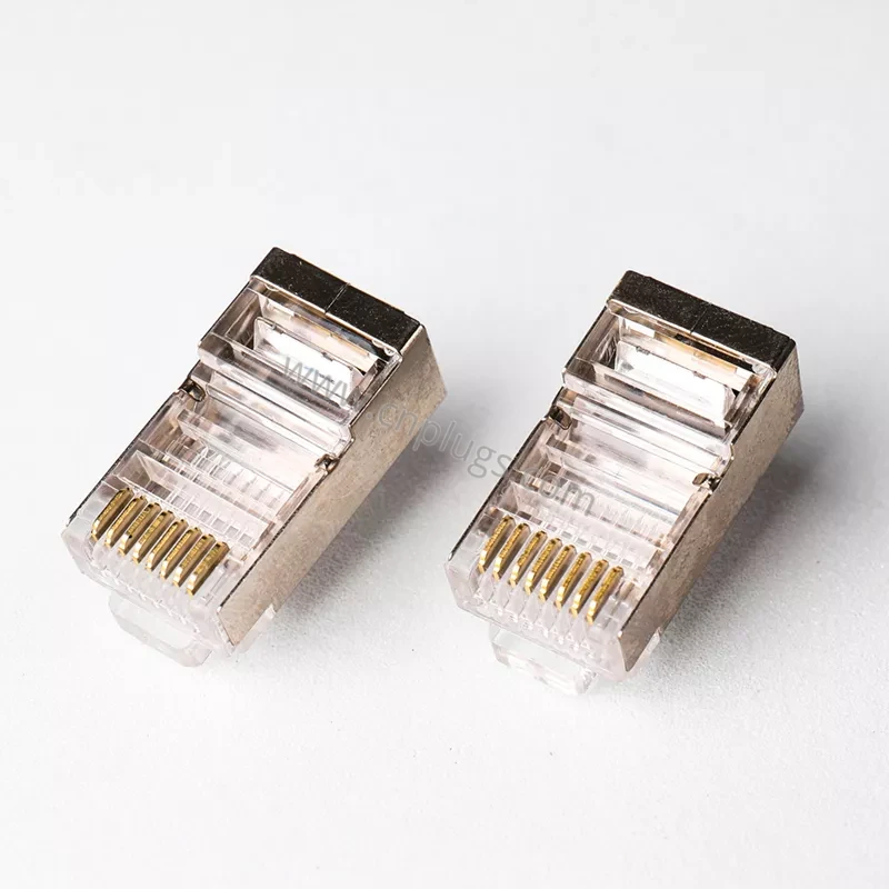 UTP vs. STP RJ45 Plugs: When Should You Use Shielded Connectors? 7 Shielded pass through RJ45 plug crimp wings clamping cable foil and drain wire for shield continuity